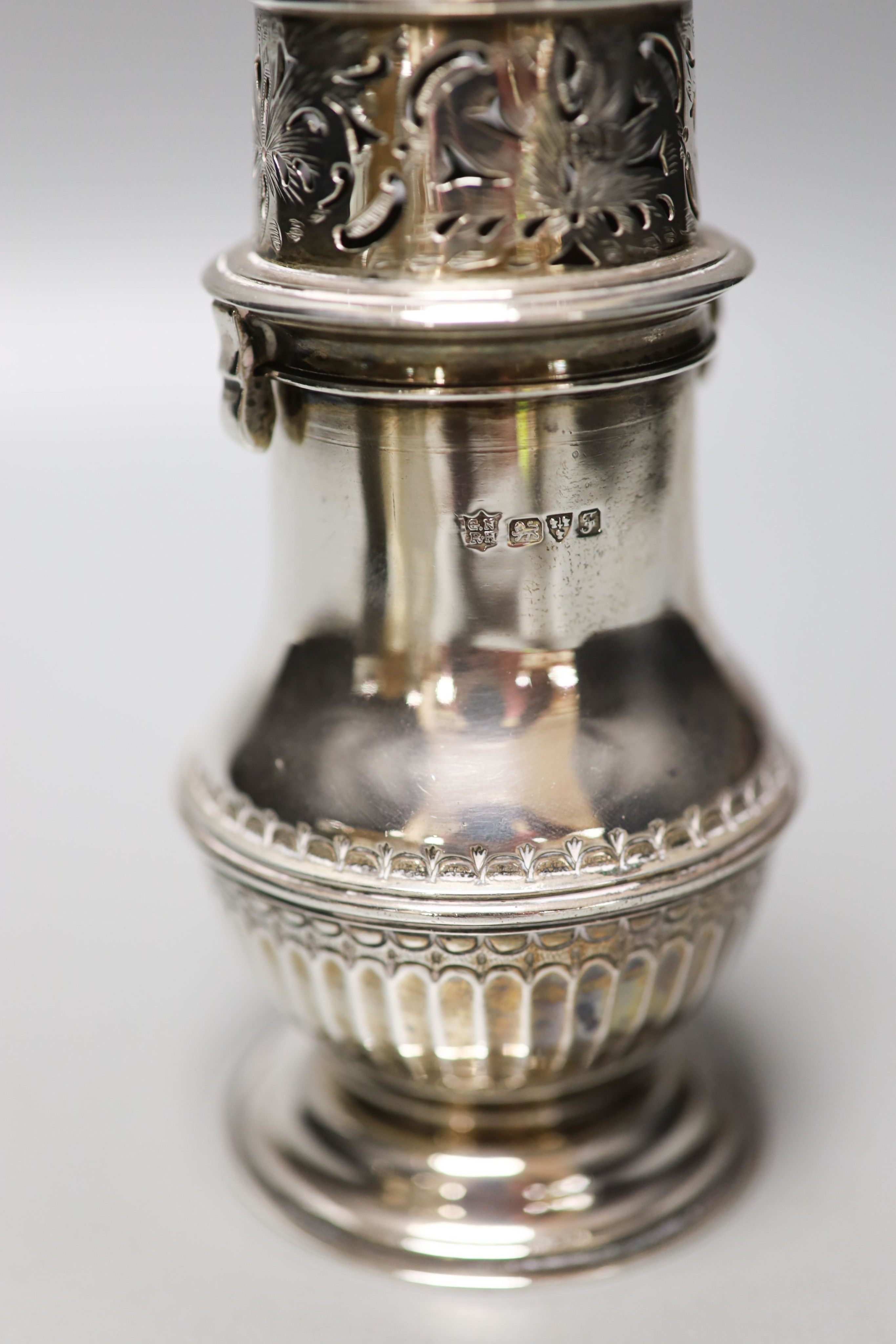 A Victorian silver travelling telescopic cup, Wright & Davis, London, 1881, 89mm, two sugar casters, a mounted glass tidy and a silver mounted salts bottle.